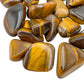 Side angle of Tiger Eye tumbled stone, kept near for Confidence, hand-selected from Northern Cape, South Africa.