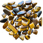 Back view of Grade A Tiger Eye tumbled stone showing natural surface