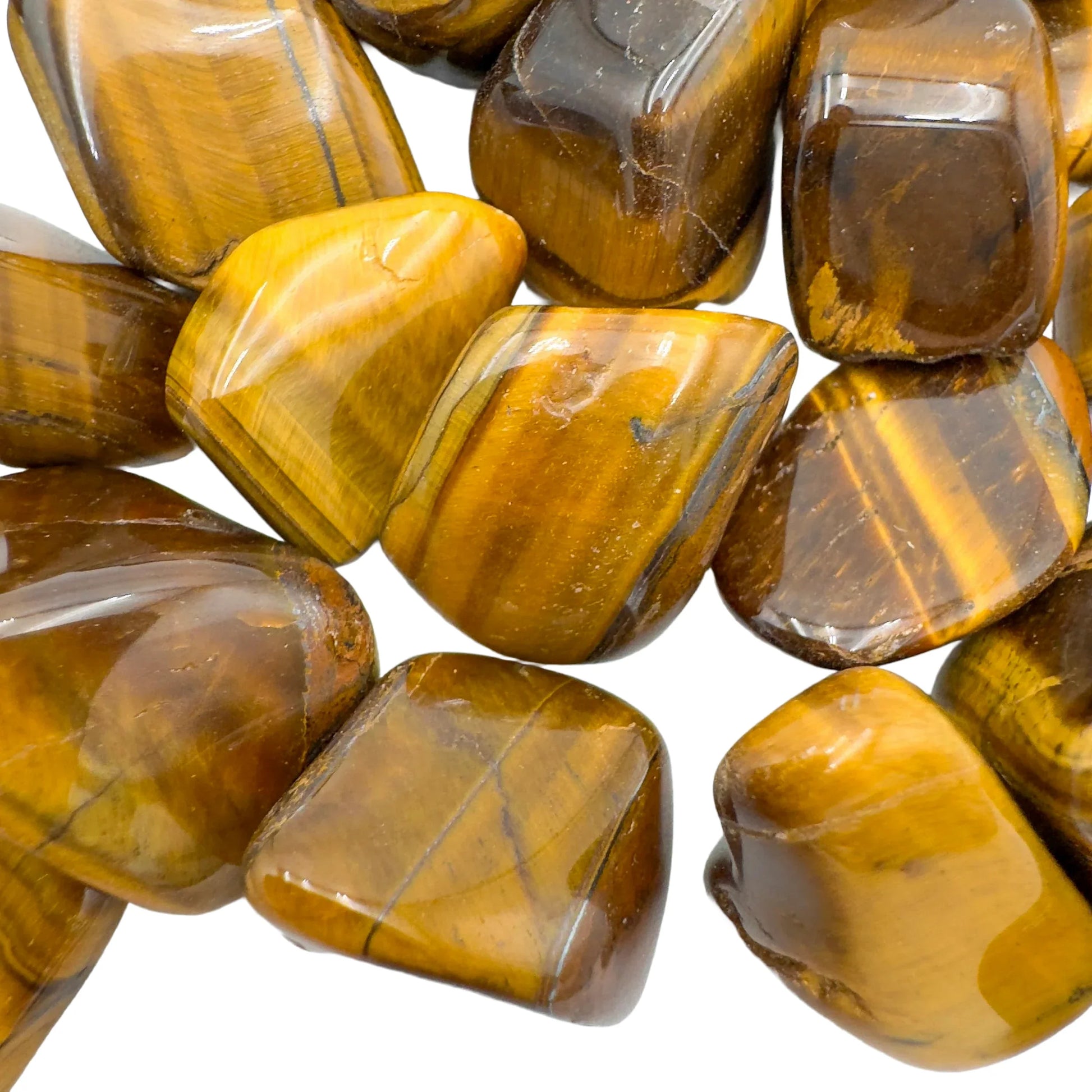 Looking down on Tiger Eye tumbled stone, associated with Confidence and Career, sourced from Northern Cape, South Africa.