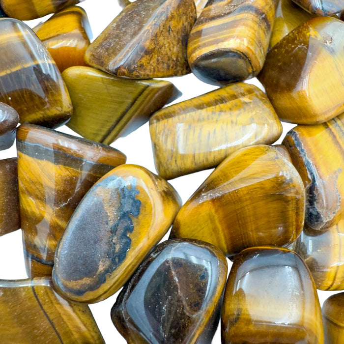 Reverse angle of Tiger Eye tumbled stone, sourced from South Africa.