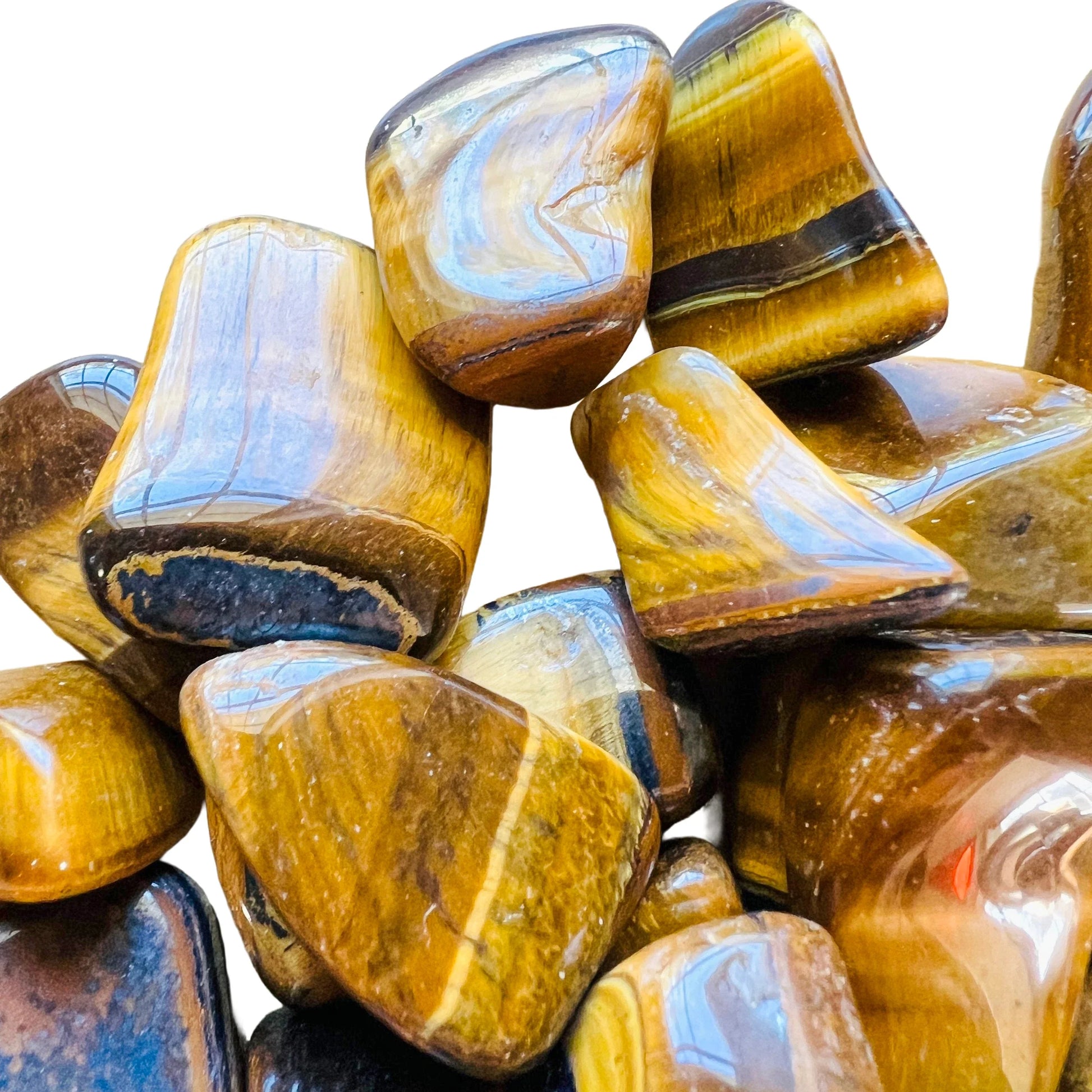 Full profile of Grade A Tiger Eye tumbled stone ready to ship from Beyond Bohemian