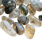 Side perspective of Quartz tumbled stone, for Cleansing and Meditation, showing soft luster.