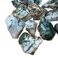 Up-close view of Grade A green Tree Agate raw stone, showing honest grain.
