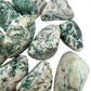 Top angle of Grade A Tree Agate tumbled stone, showing subtle veining, from Botswana.