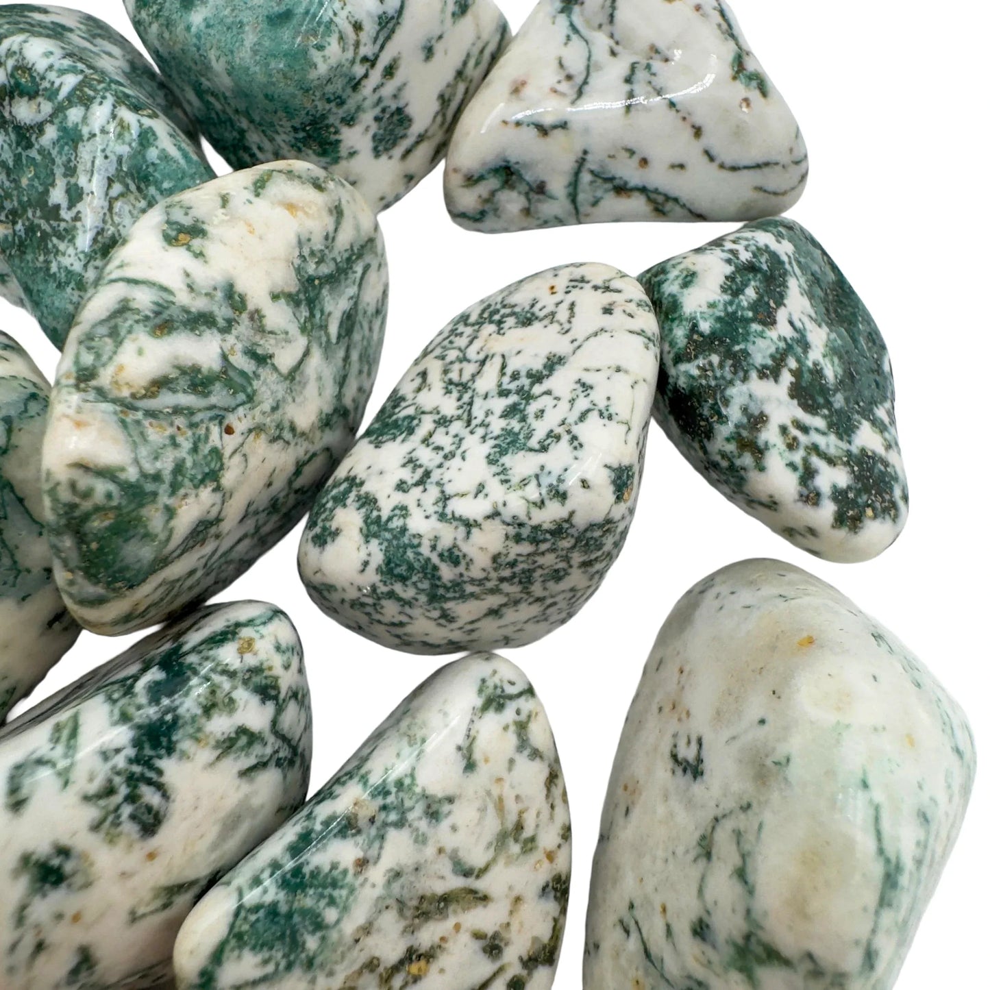 Top angle of Grade A Tree Agate tumbled stone, showing subtle veining, from Botswana.