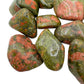 Side-on view of Unakite tumbled stone, drawn on for Emotional Healing and Healing.