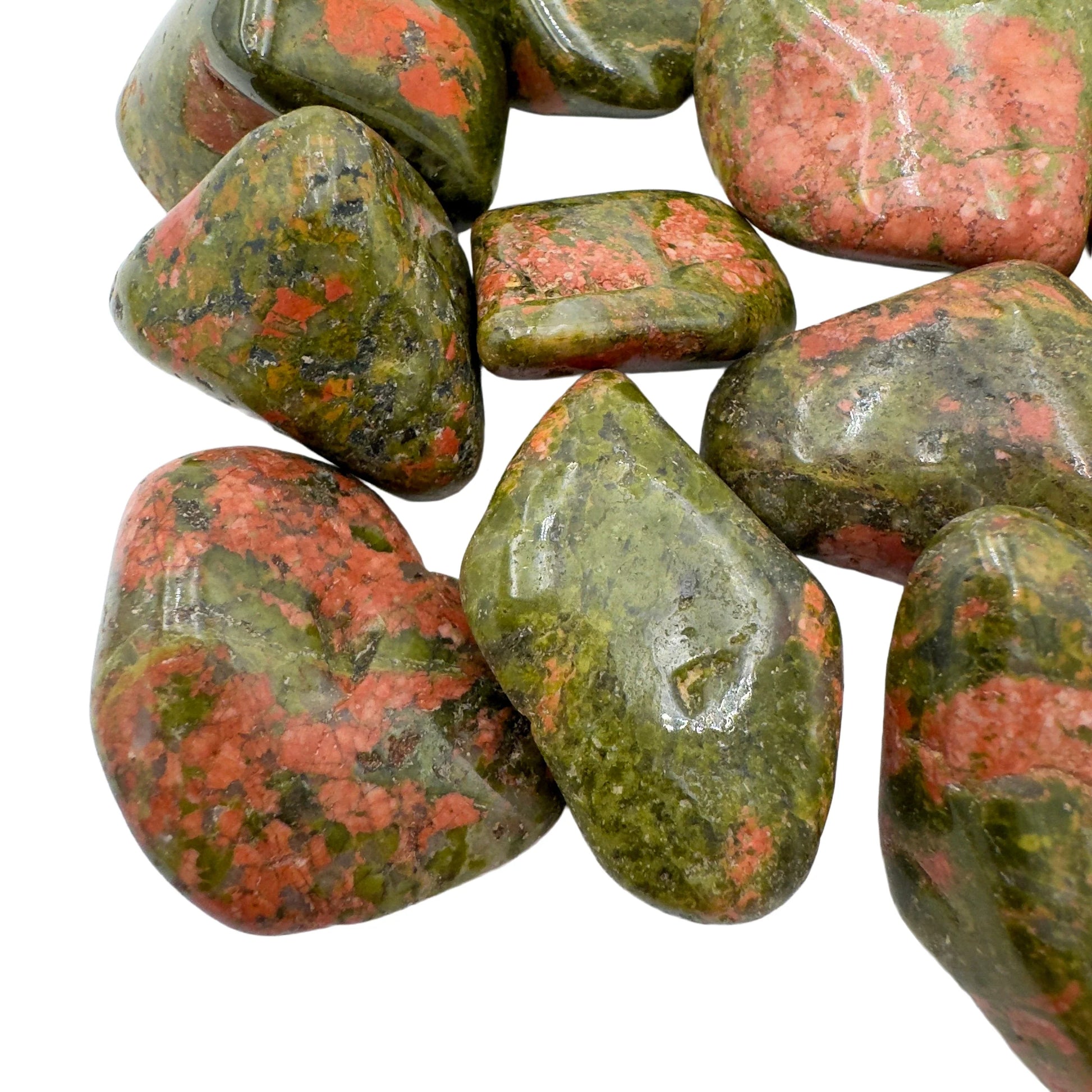 Side-on view of Unakite tumbled stone, drawn on for Emotional Healing and Healing.