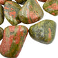 Overhead angle of Unakite tumbled stone, showing natural texture.