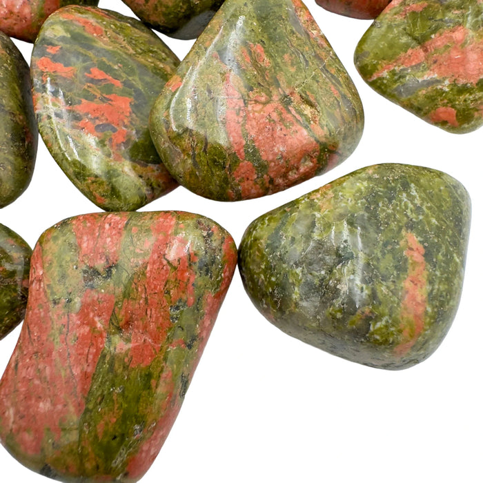 Overhead angle of Unakite tumbled stone, showing natural texture.