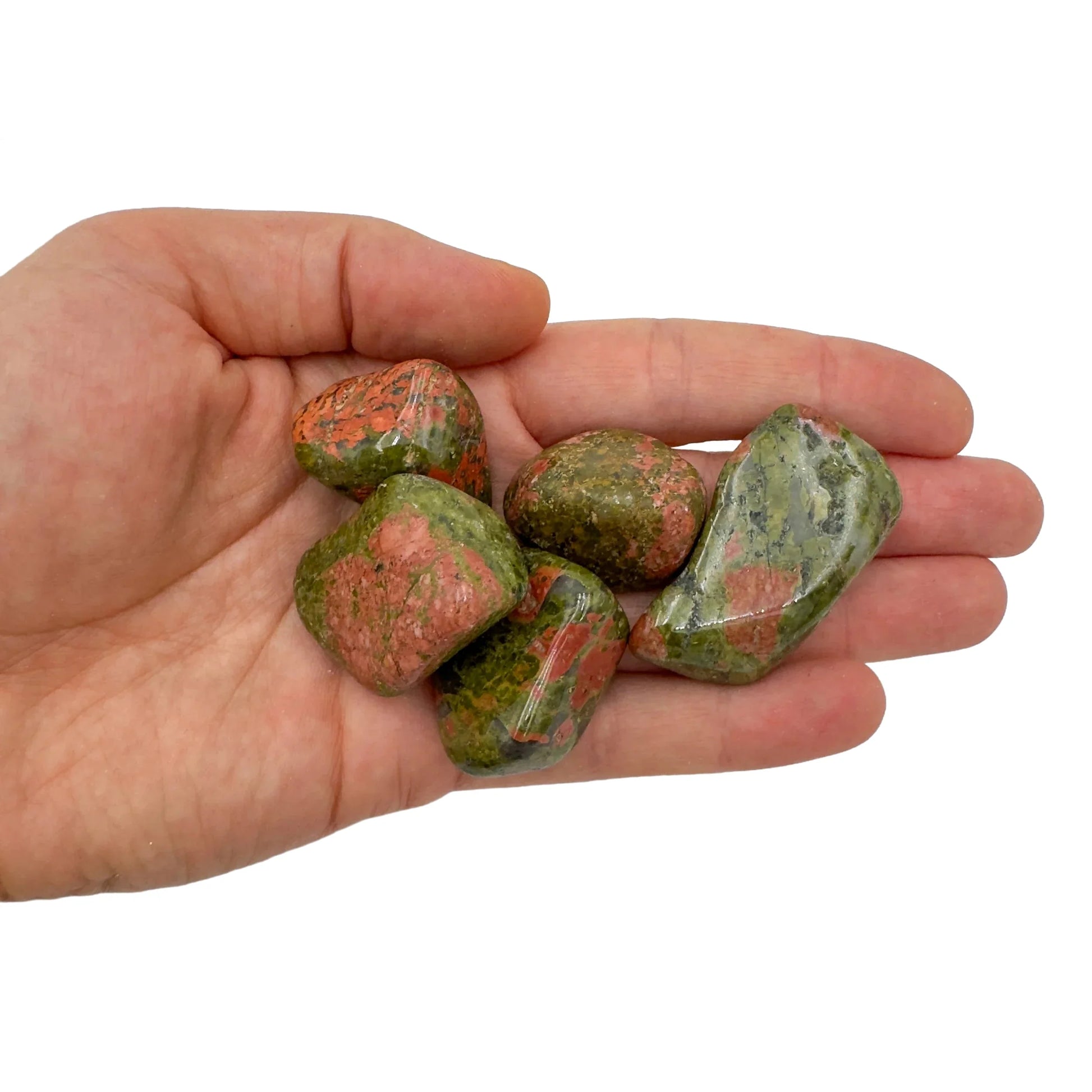 Natural light view of one Unakite tumbled stone for scale, sourced from Northern Cape, South Africa.