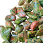 Overhead view of Grade AA green Unakite tumbled stone, often worked with for Emotional Healing.