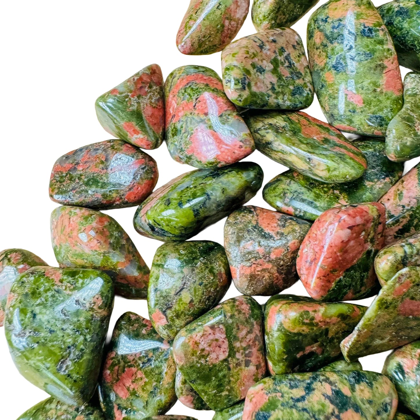 Overhead view of Grade AA green Unakite tumbled stone, often worked with for Emotional Healing.