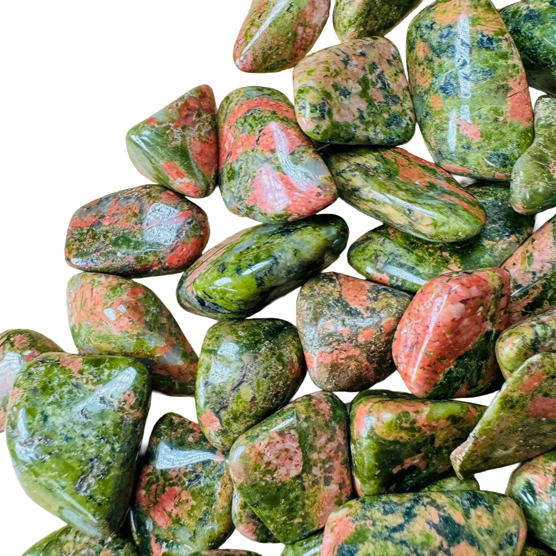 Overhead view of Grade AA green Unakite tumbled stone, often worked with for Emotional Healing.