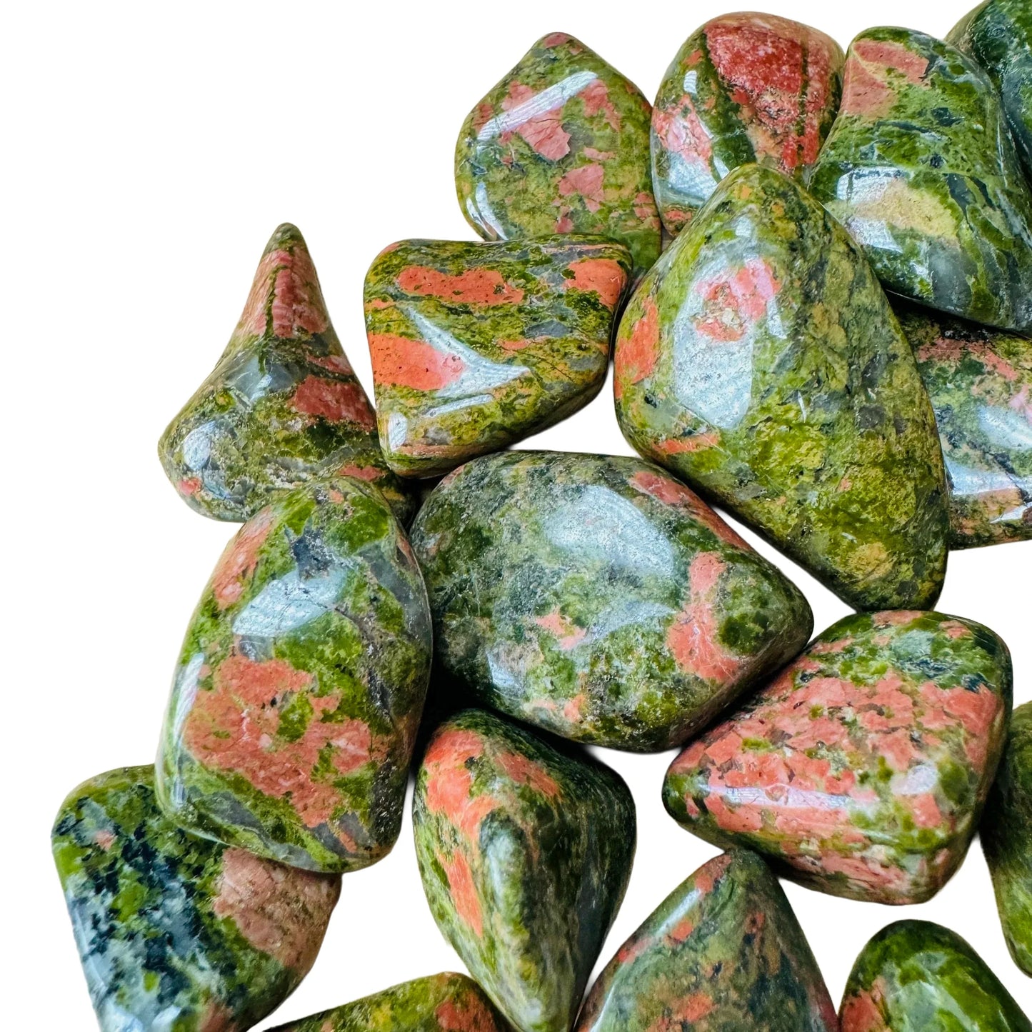 Edge view of Unakite tumbled stone, for Emotional Healing, showing matte finish.
