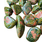 Alternate angle of Unakite tumbled stone, showing characteristic patterning.