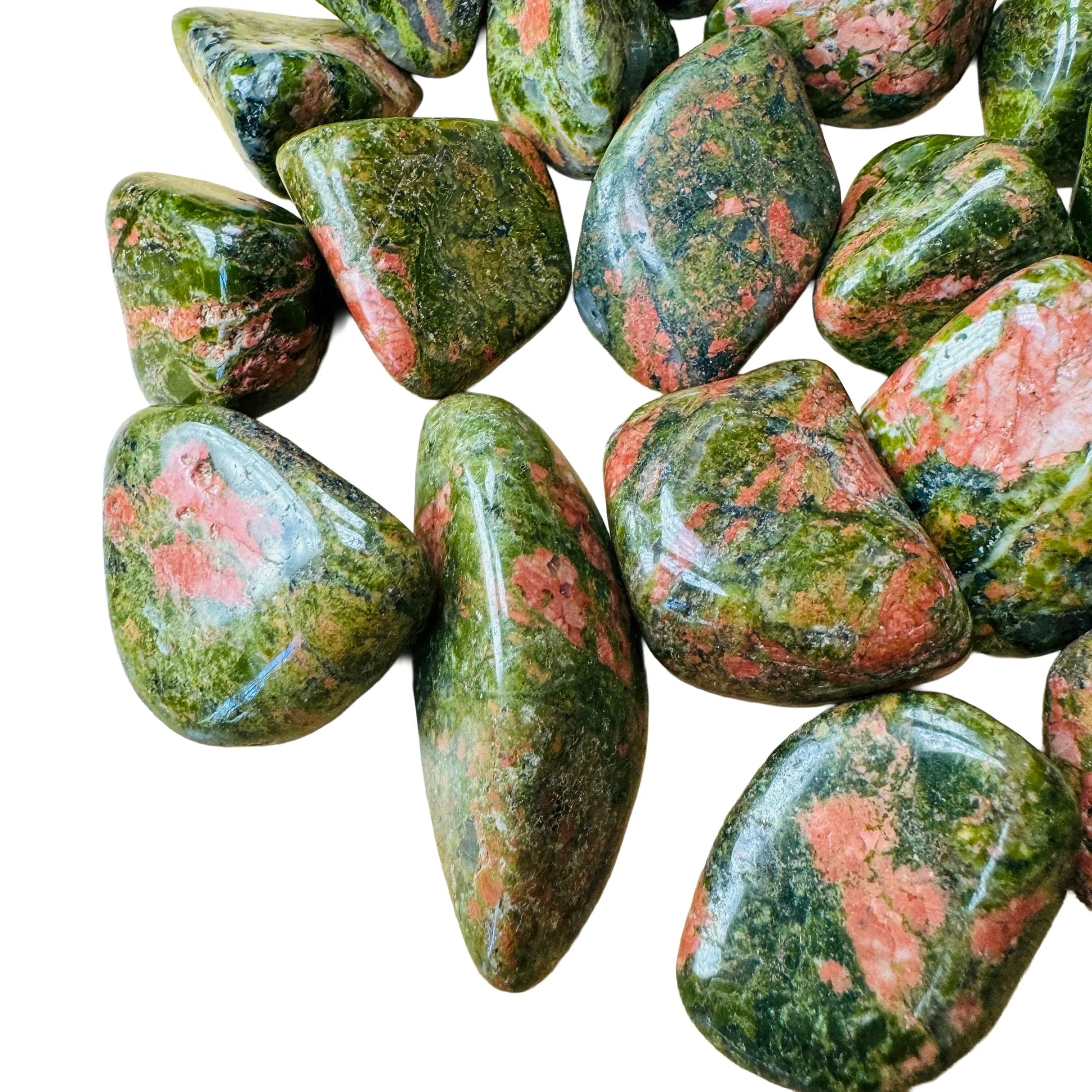 Alternate angle of Unakite tumbled stone, showing characteristic patterning.