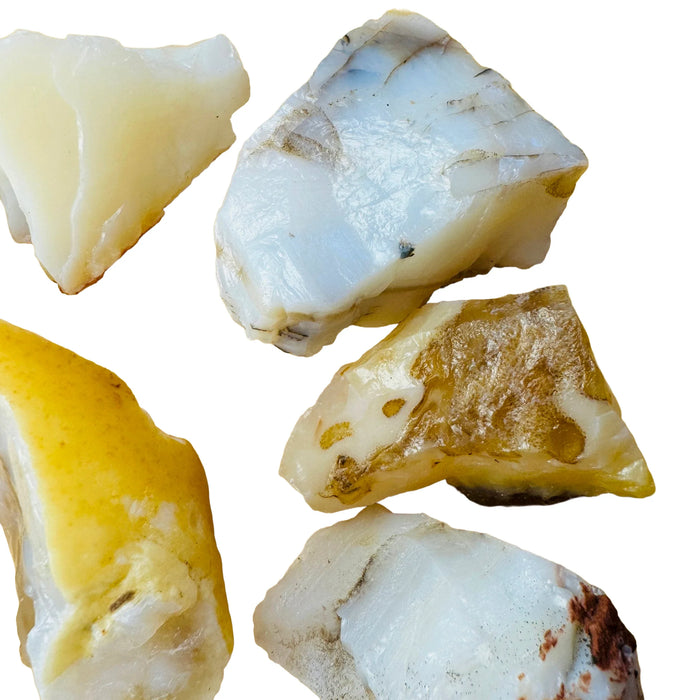 Texture-level view of White Opal raw stone, sourced from Brazil, to support Intuition.