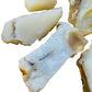 Top-side view of White Opal raw stone, showing tight grain.