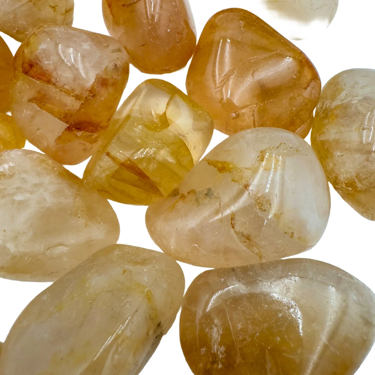 Bottom side of Golden Healer tumbled stone, sourced from Madagascar.