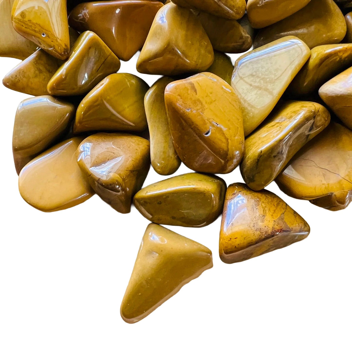 Magnified detail of Yellow Jasper tumbled stone, Madagascar-sourced, often paired with practices around Confidence.