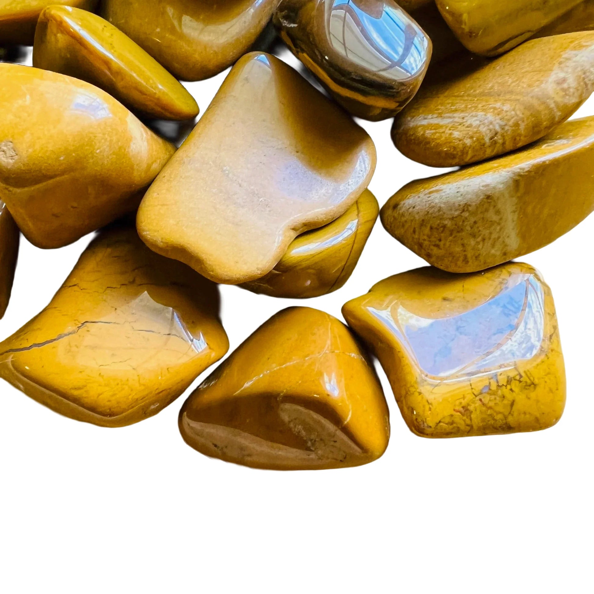 Side angle of Yellow Jasper tumbled stone, showing matte finish, from Madagascar.