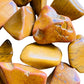 Side angle of Yellow Jasper tumbled stone, showing translucent edges, hand-selected from Sofia, Madagascar.