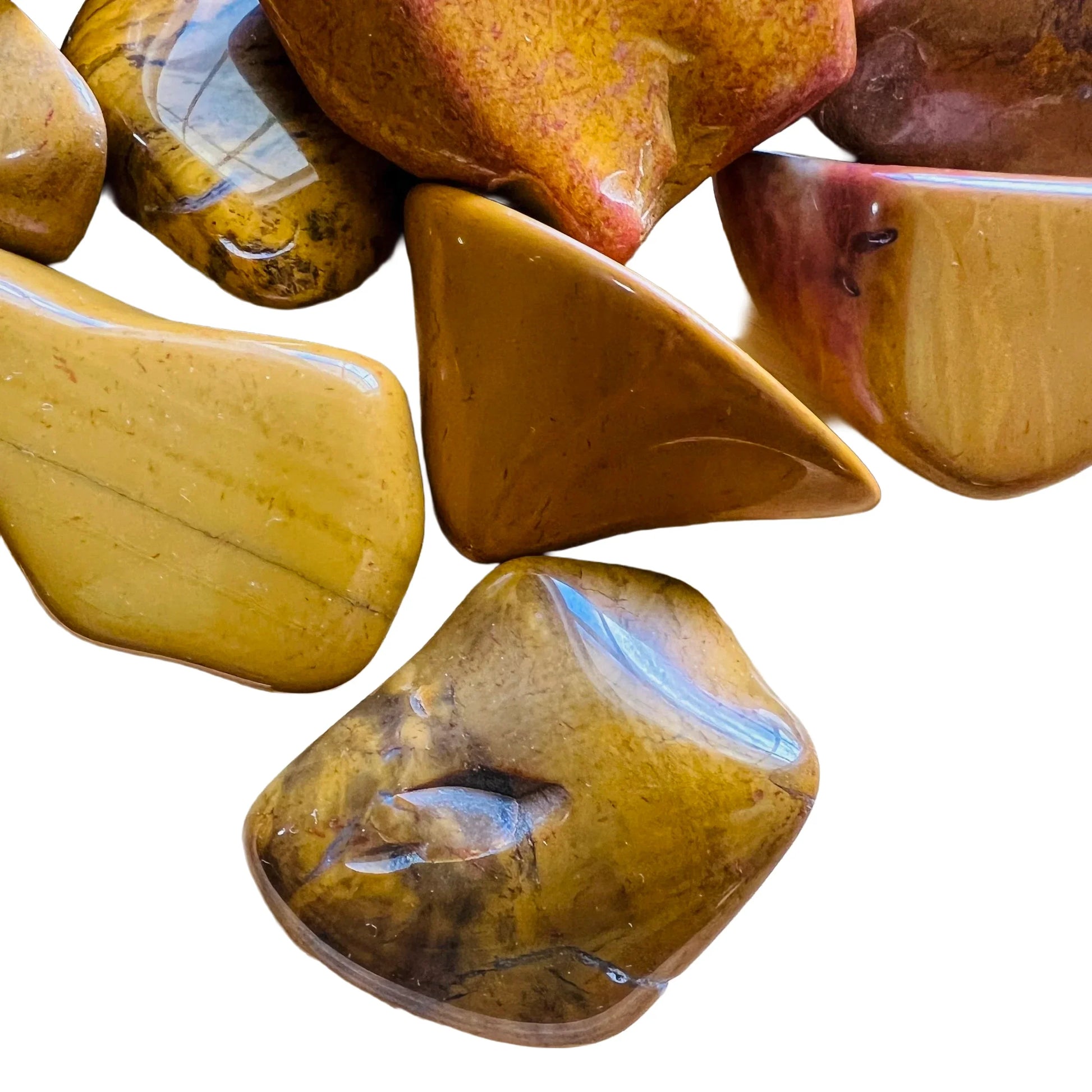 Underside view of Yellow Jasper tumbled stone, carried for Confidence.