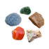 Cancer Crystal Kit: peach moonstone, pink opal, banded carnelian, blue calcite and emerald, shown together on white