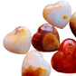 Lifestyle view of a Carnelian polished heart, from Boeny, Madagascar.