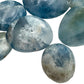 Top angle of Celestite palm stone, sourced from Sakoany, Madagascar, often paired with practices around Stress Relief.