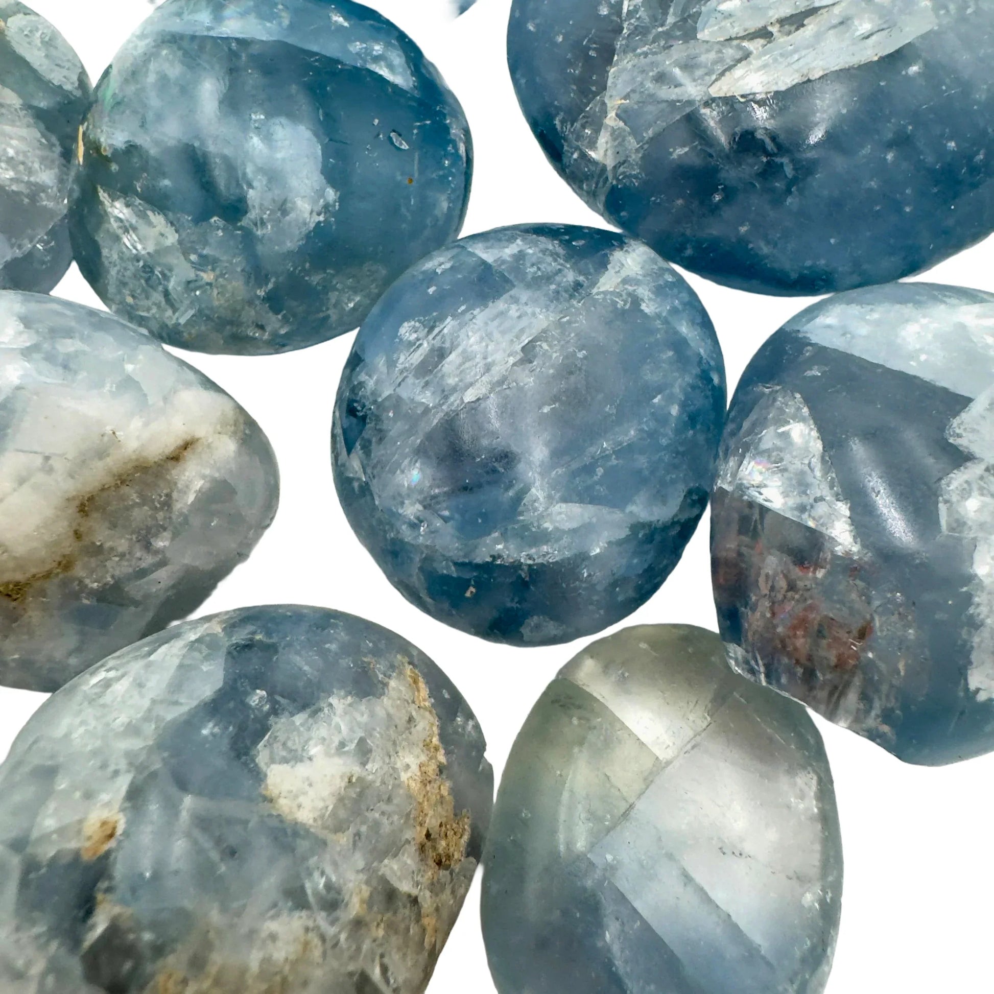 Reverse angle of Celestite palm stone, often paired with practices around Stress Relief.