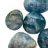 Held in hand, a Celestite palm stone kept close for Stress Relief.