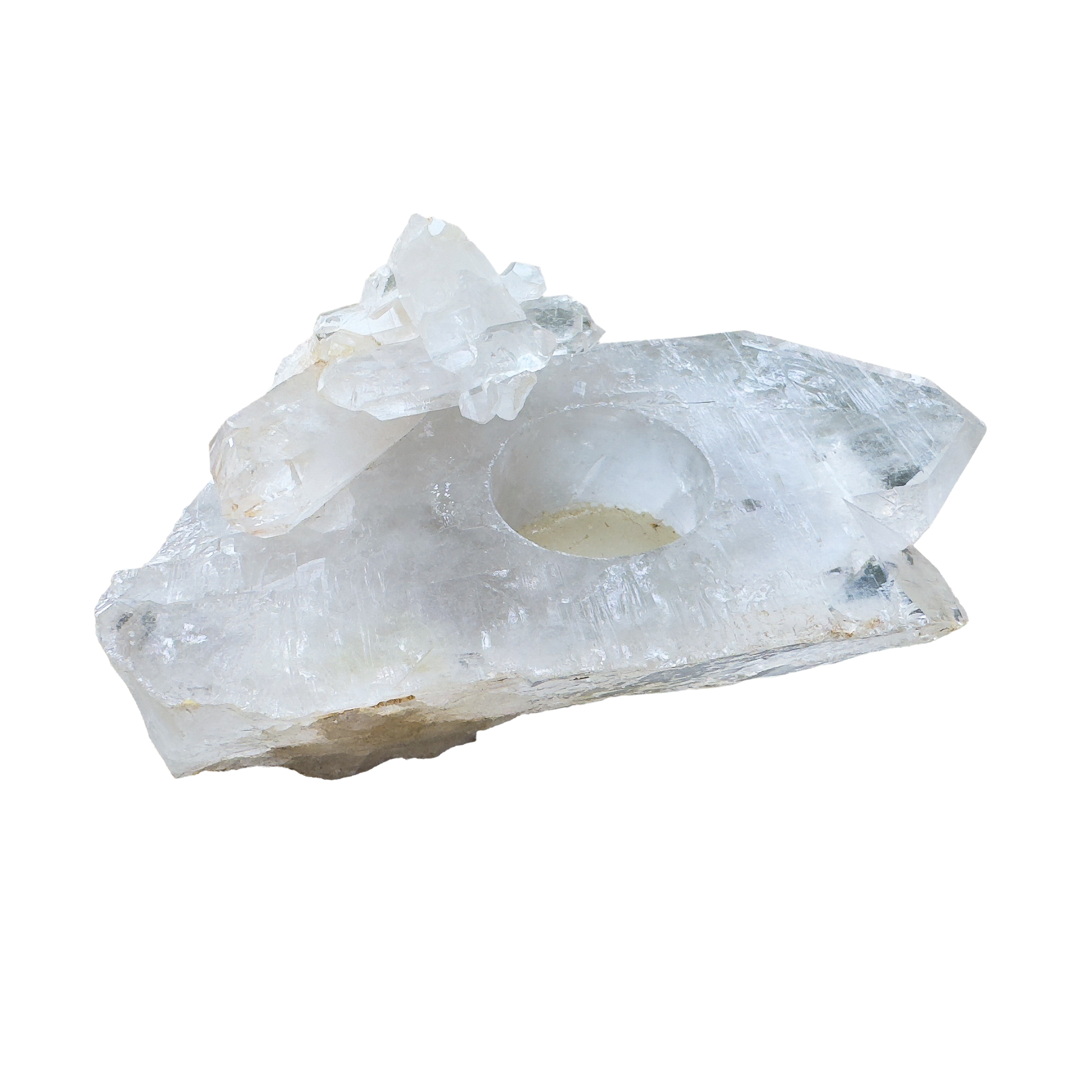 Clear quartz candle holder from above, drilled well set into transparent crystal