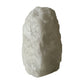 Clear quartz crystal lamp lit, soft warm glow through the stone, from Brazil