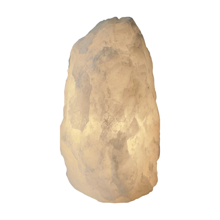 Clear quartz crystal lamp lit, full view with warm illumination, from Minas Gerais, Brazil