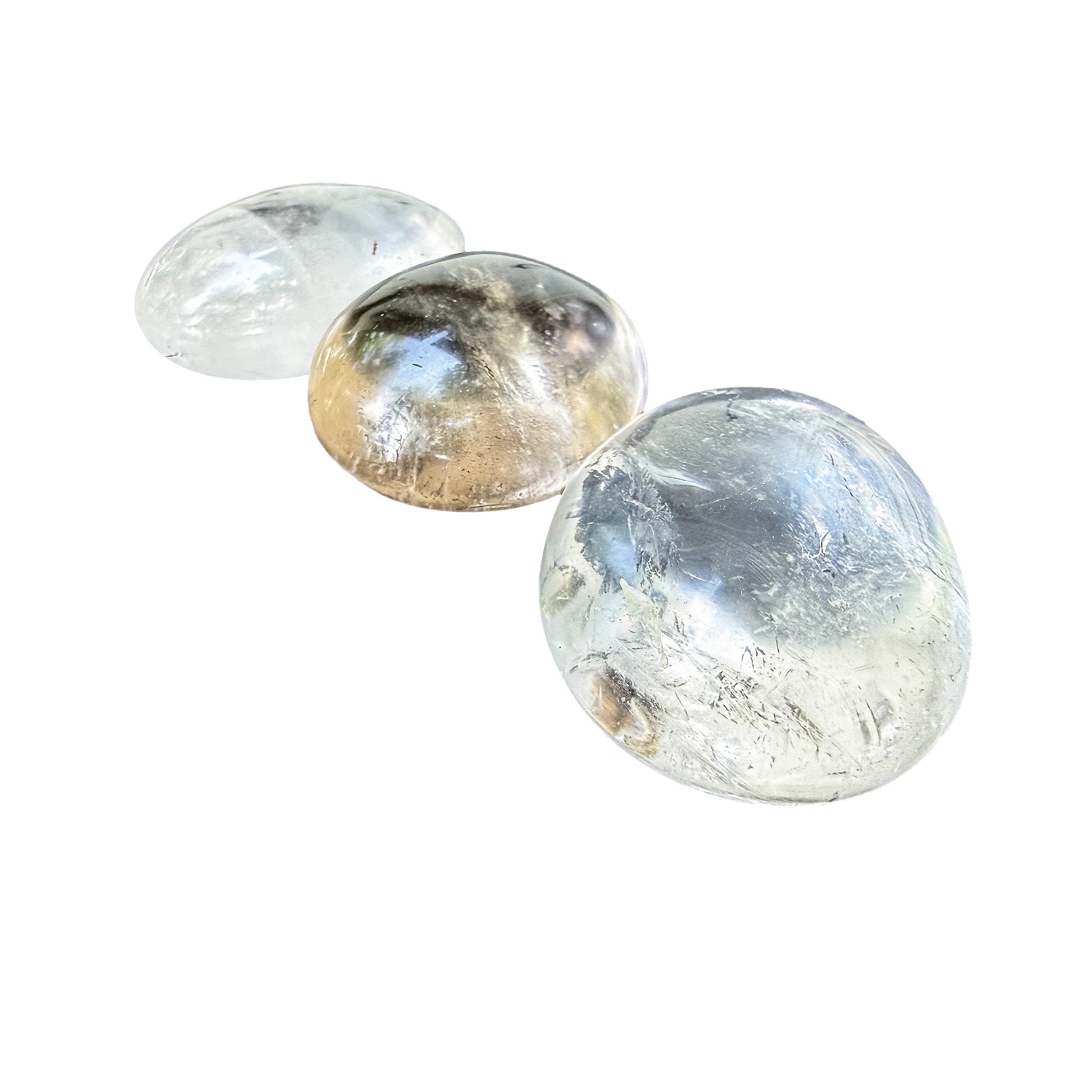 Light passing through the thinner edge of a Clear Quartz palm stone