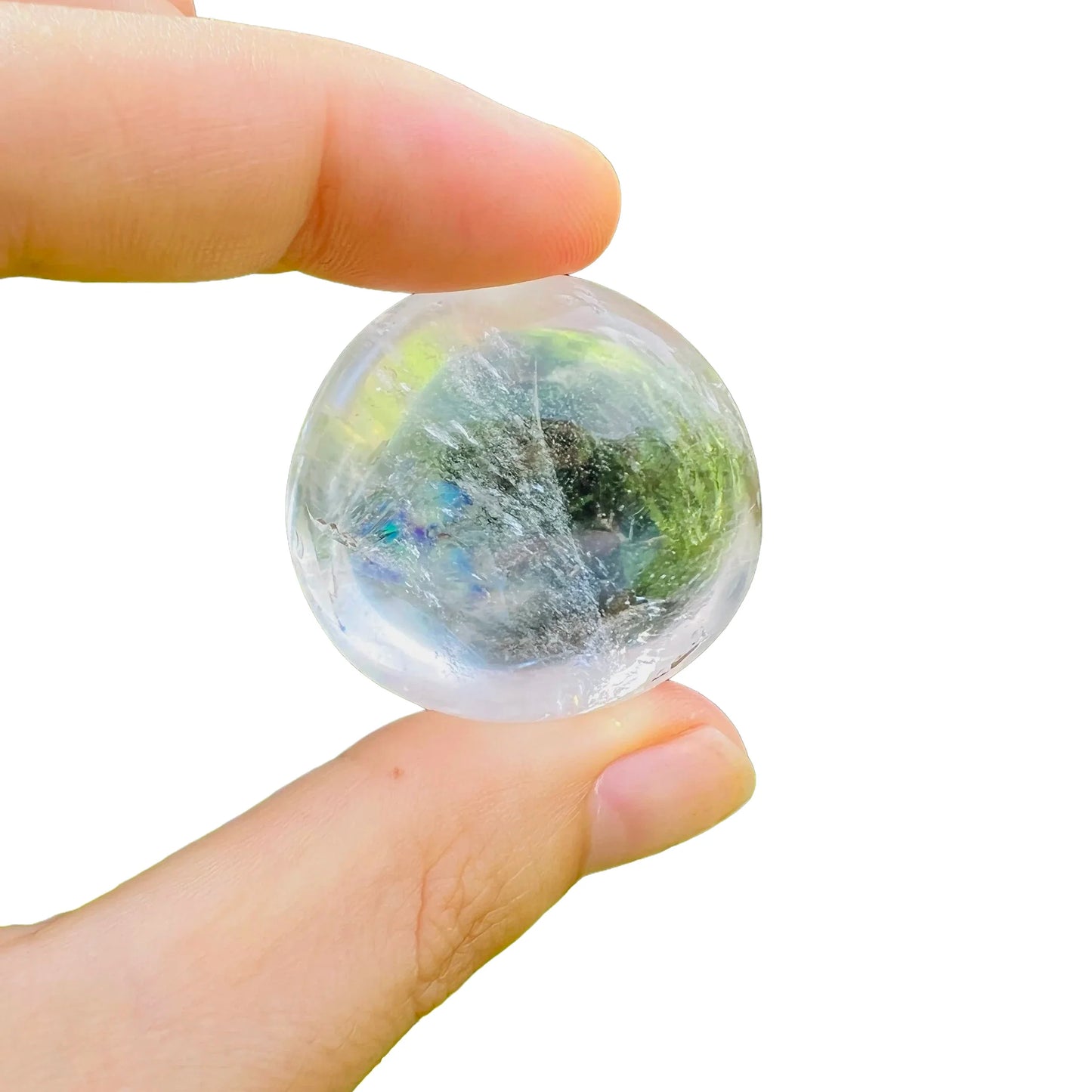 Held in hand, a single Clear Quartz palm stone from Vakinankaratra, Madagascar.