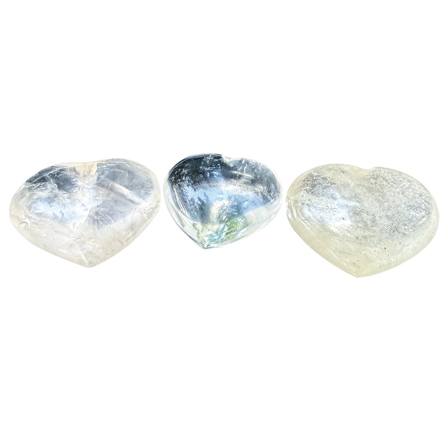 Overhead view of Clear Quartz polished hearts, AA grade, Madagascar sourced