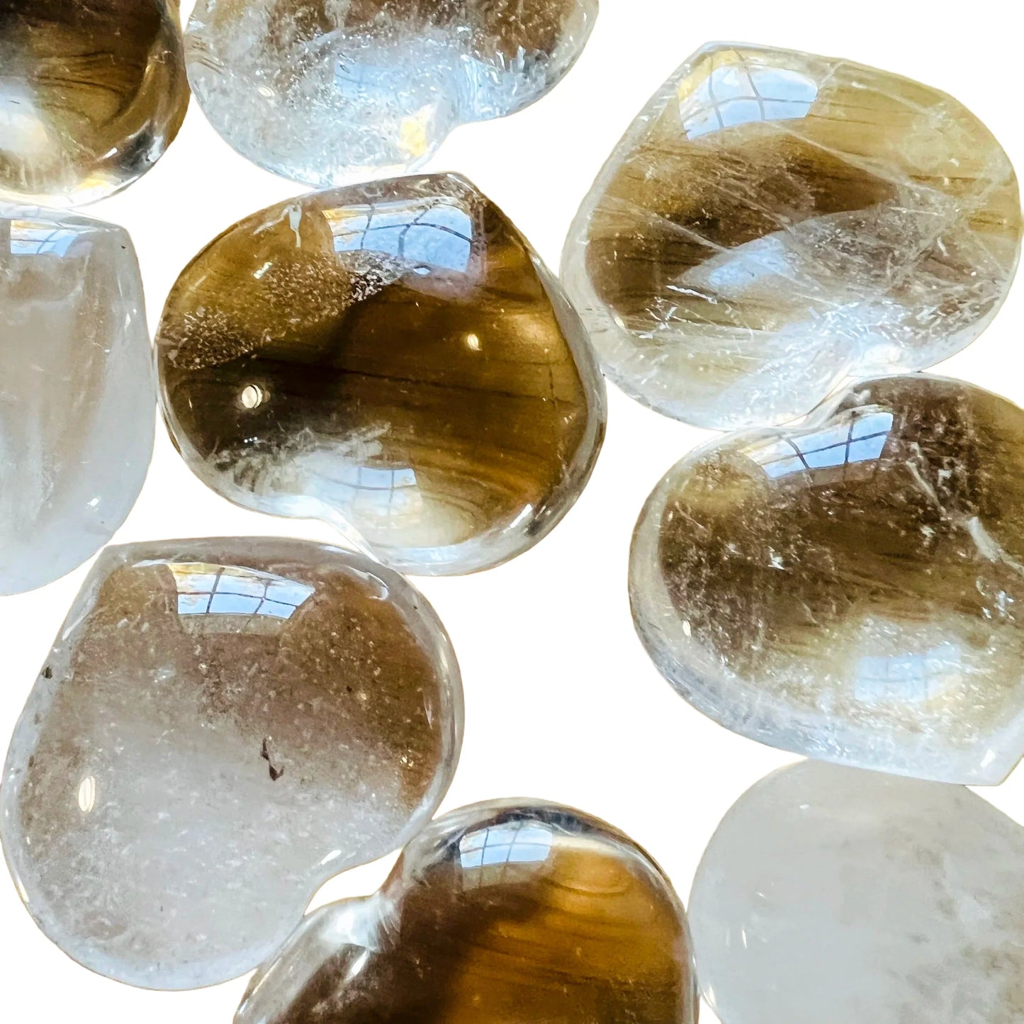 Detail of Grade AA Clear Quartz polished heart, sourced from Madagascar, showing natural inclusions.