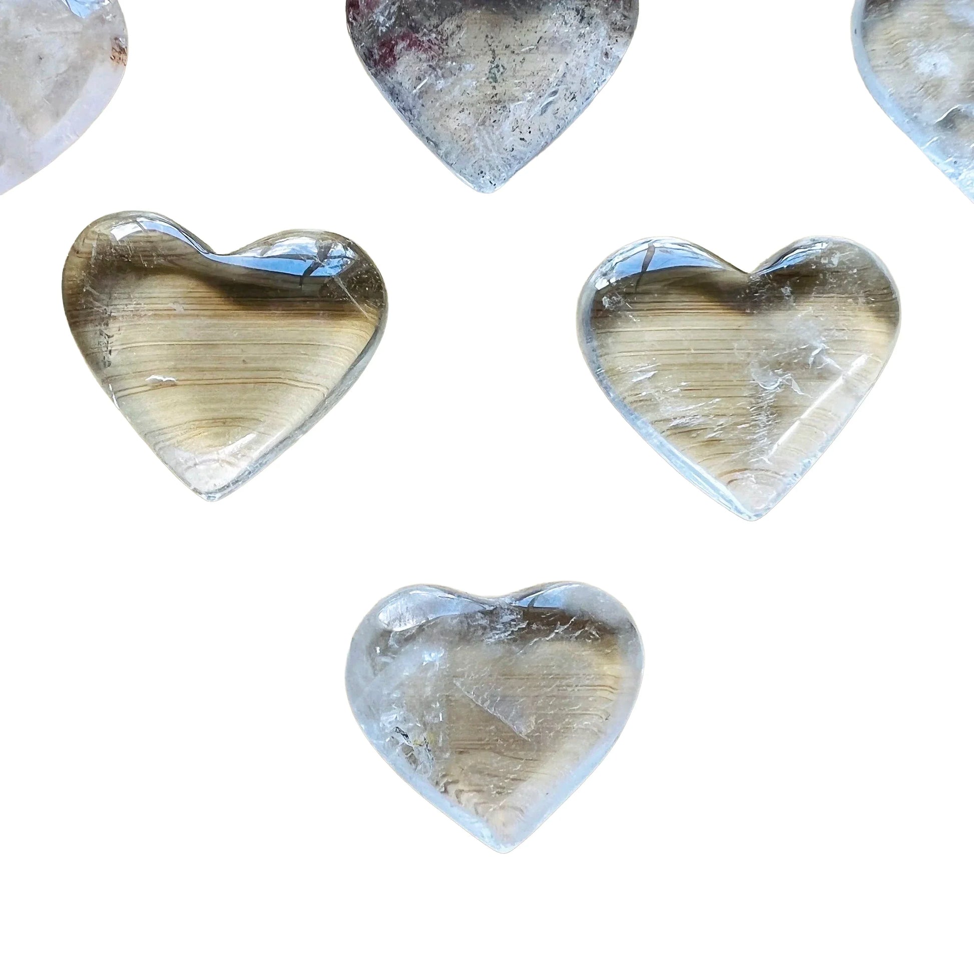 Side profile of Clear Quartz polished heart, linked to Cleansing and Meditation.