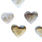 Top-side view of Clear Quartz polished heart, showing subtle veining, for Cleansing and Meditation.