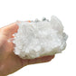 Palm-scale view of a Clear Quartz specimen linked to Cleansing and Meditation.