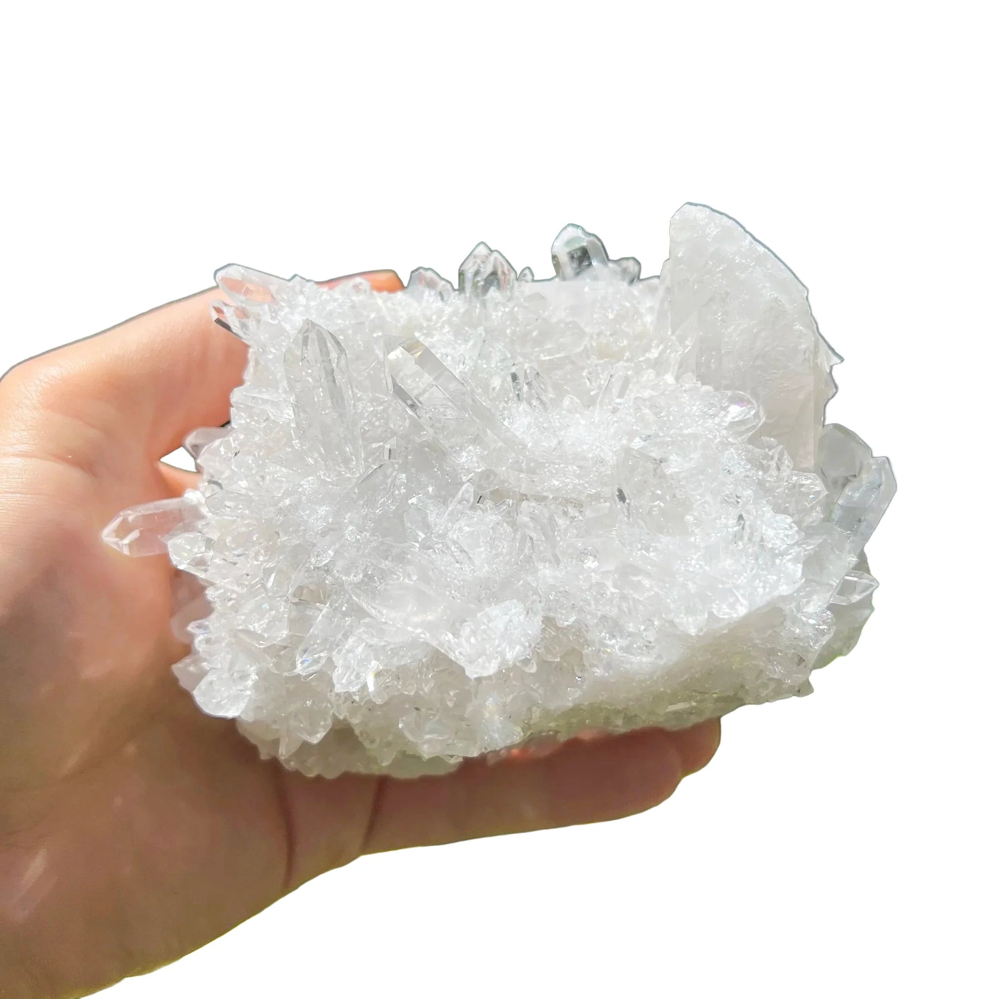 Palm-scale view of a Clear Quartz specimen linked to Cleansing and Meditation.
