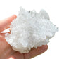 Back view of Grade AAA Clear Quartz cluster showing natural surface