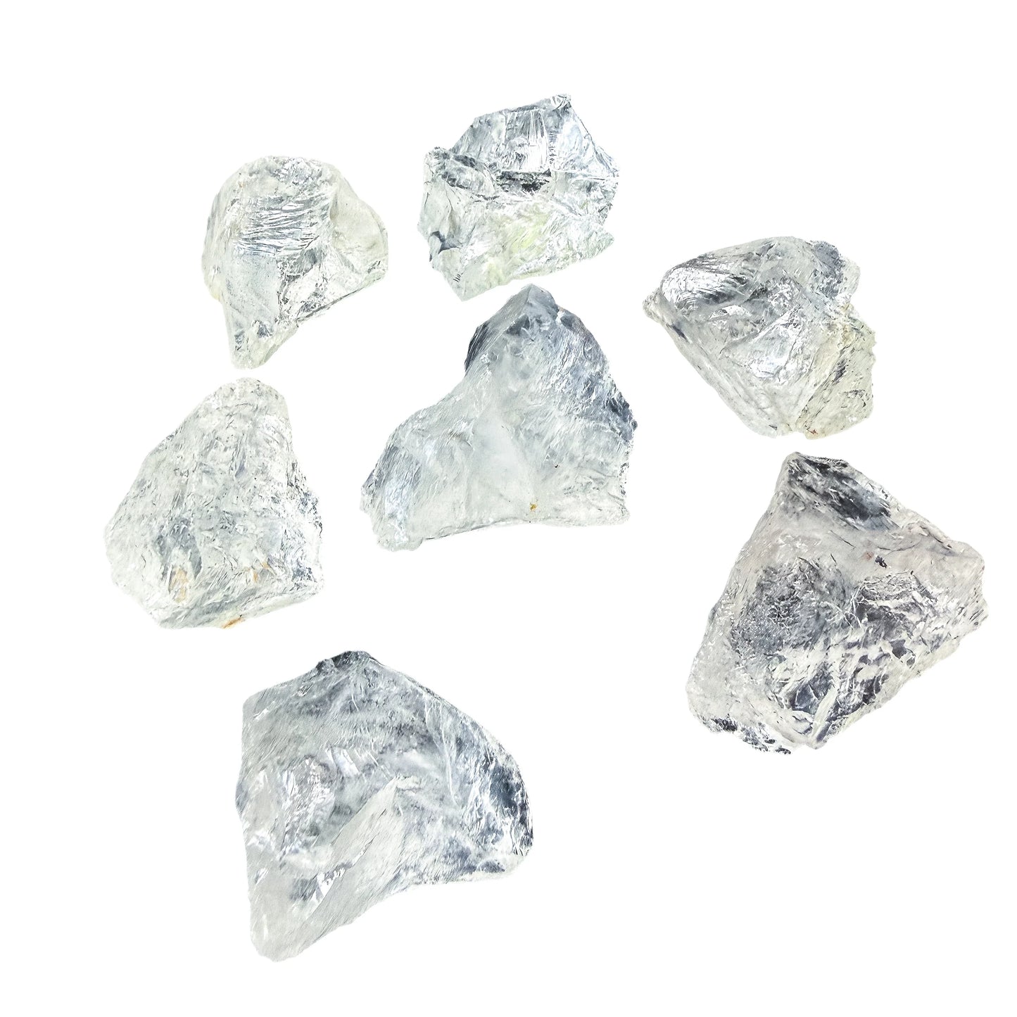Angled view of large Clear Quartz rough pieces showing conchoidal fracture faces