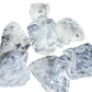Side profile of a single Clear Quartz rough piece showing thickness and raw edges