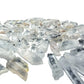 Close detail on a cluster of Clear Quartz points, natural facets intact, no polishing