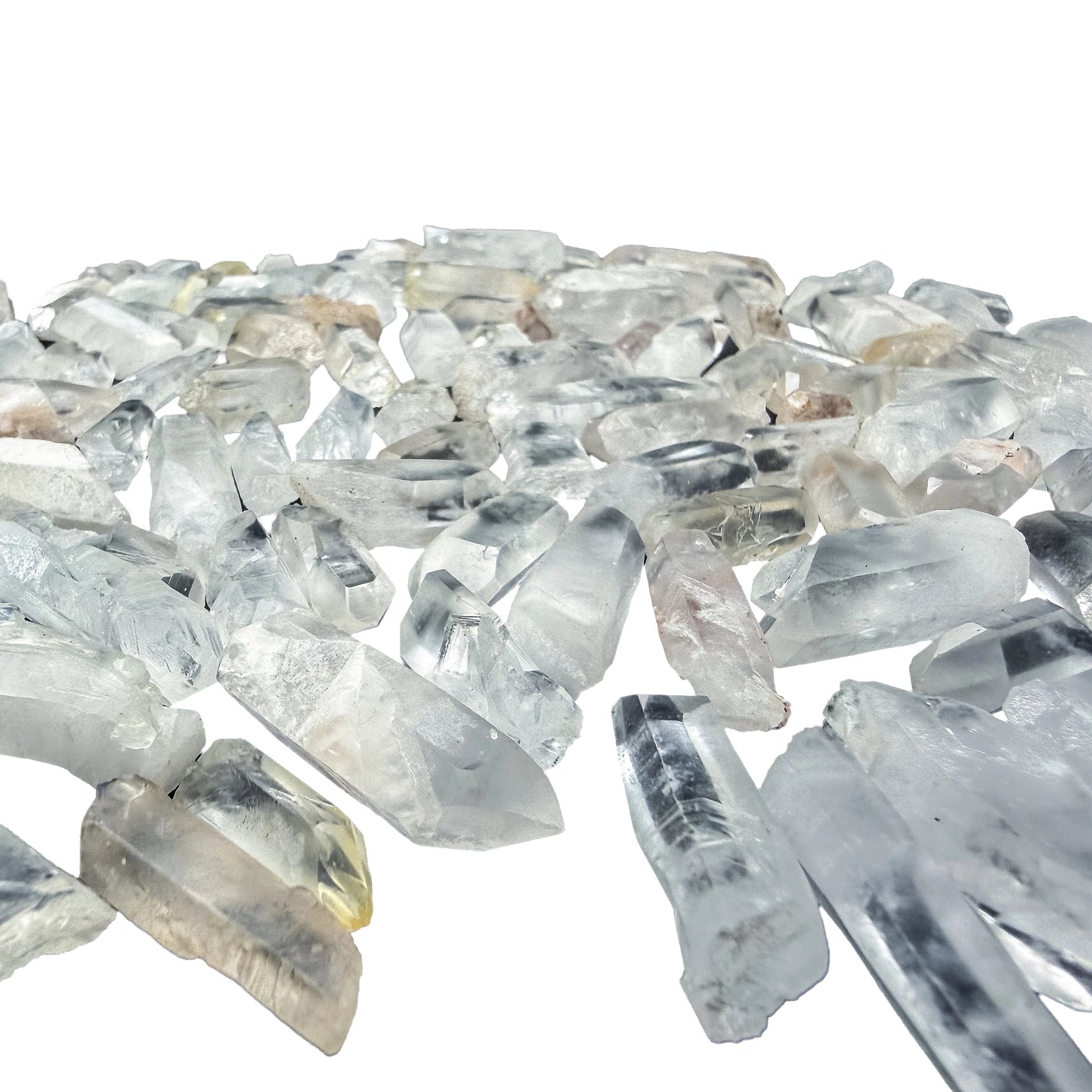 Close detail on a cluster of Clear Quartz points, natural facets intact, no polishing