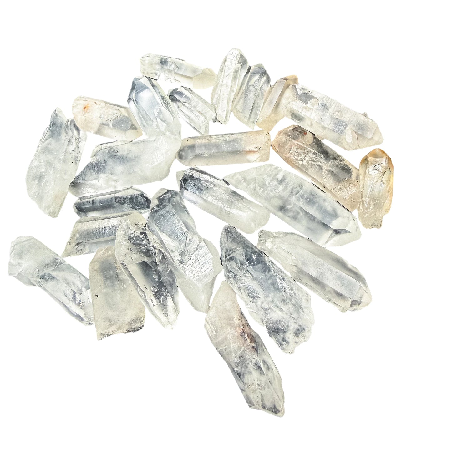 Small group of Clear Quartz points arranged to show length variation within the 0.5 to 1.5 inch range