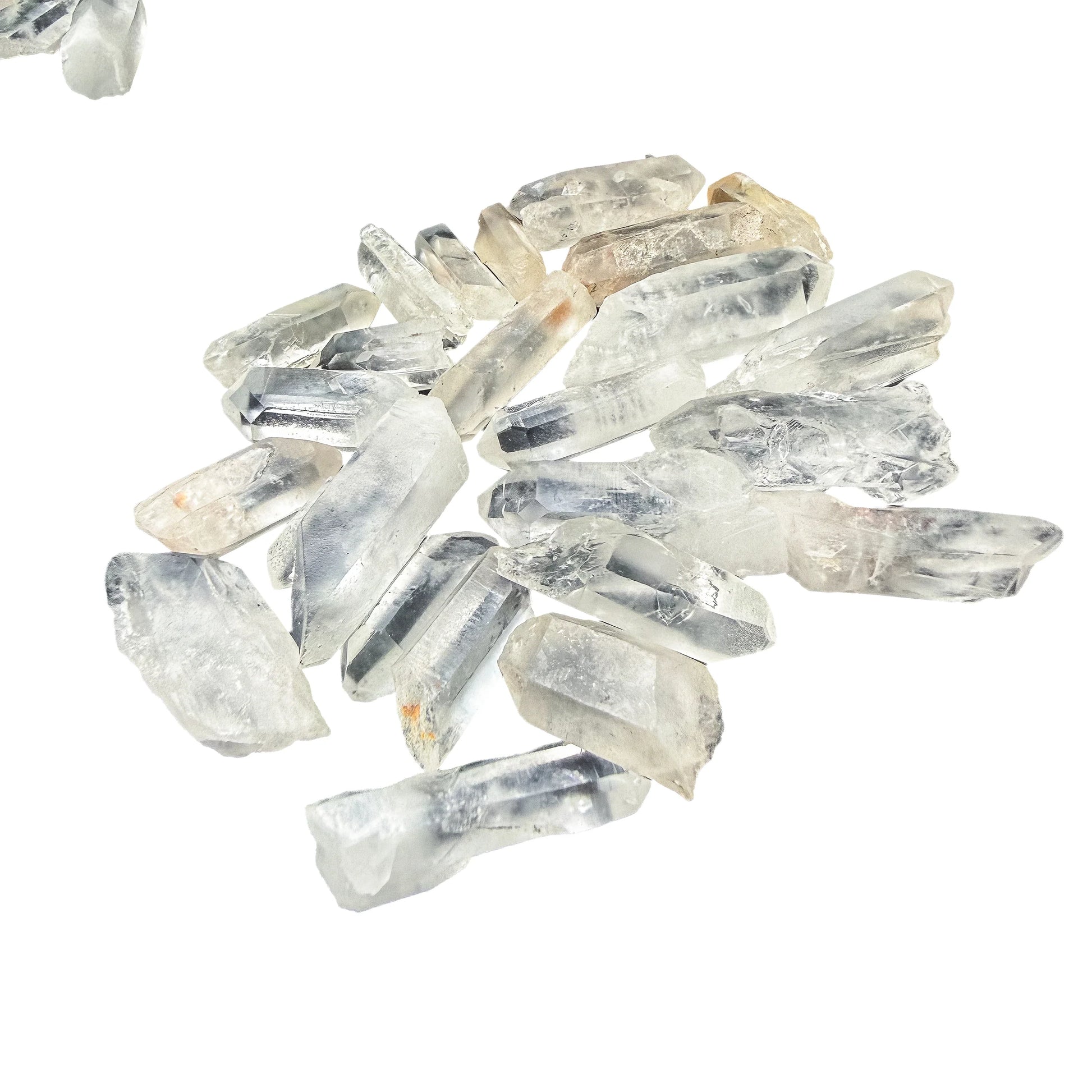Side view of Clear Quartz points laid flat, terminations pointing the same direction